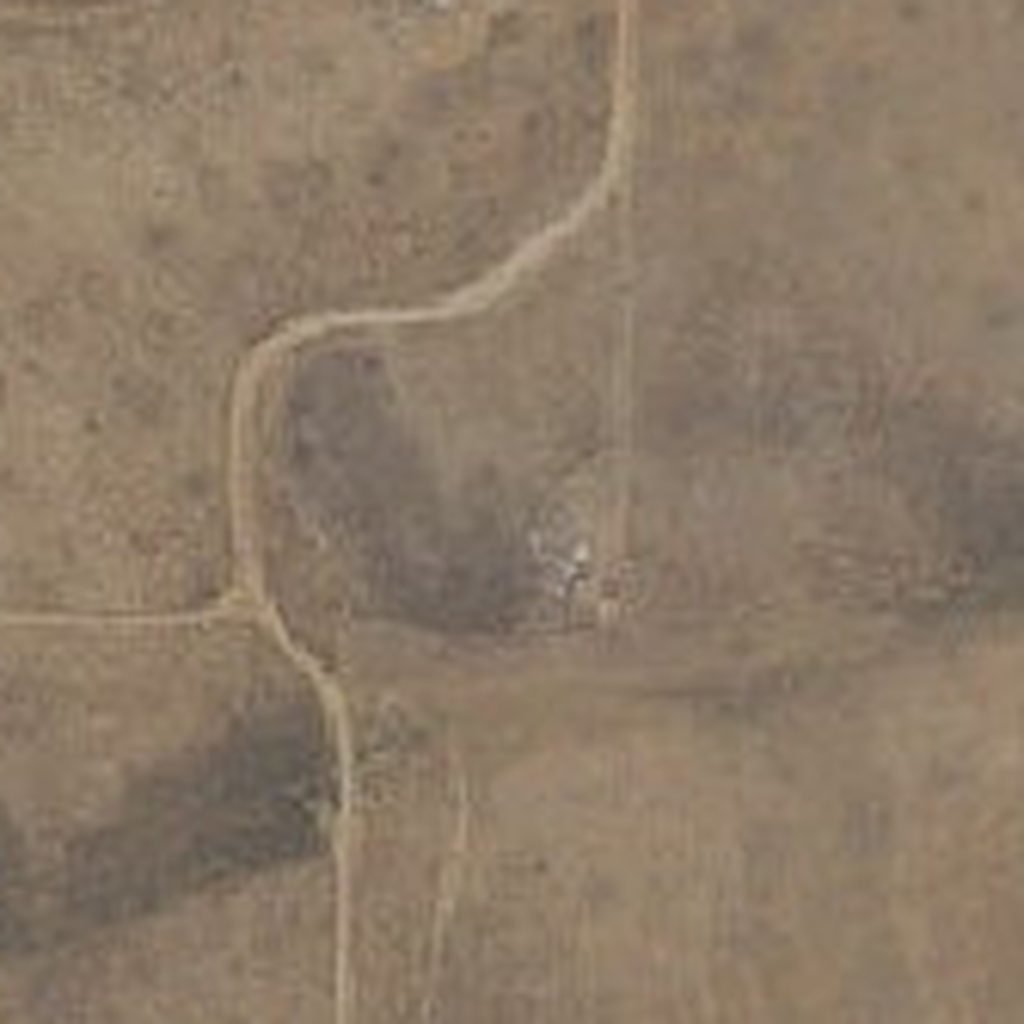Aerial of Taos Plateau mesa with its recorded boundary